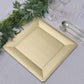 Champagne textured square serving tray on a table with greenery and glassware.