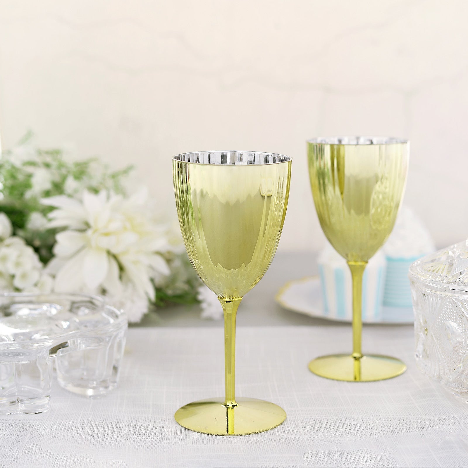 Gold disposable wine goblets in a 6 pack, perfect for parties and events.