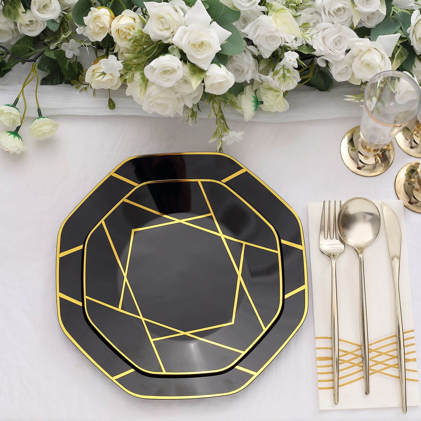 Black and gold geometric design disposable dessert plate.