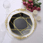 10" black and gold geometric design disposable dinner plate on a table setting.