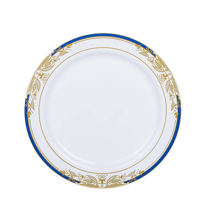 White plastic dinner plate with royal blue rim and gold vine design.
