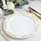 Gold embossed white plastic dinner plate with scalloped edges.