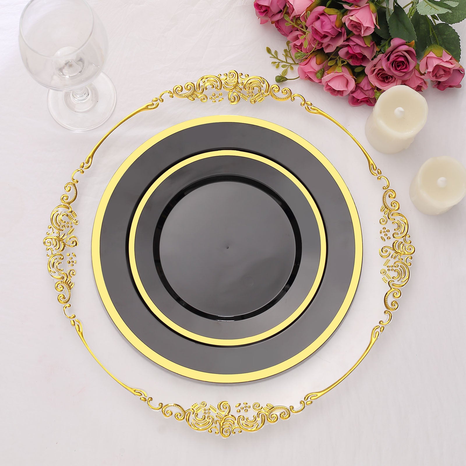 7" black and gold disposable dessert plates on a decorative table setting.