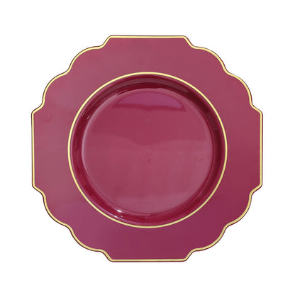 Burgundy hard plastic Baroque dinner plate with a gold rim.