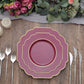 Burgundy hard plastic Baroque dinner plate with gold rim on a wooden table.