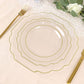 Clear hard plastic dessert plates with gold rim on a table setting.