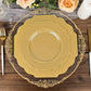 Gold hard plastic dessert plates with decorative rim on a wooden table.