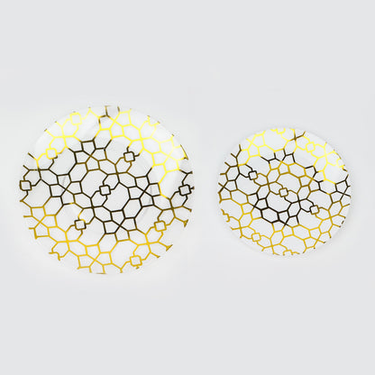 White and clear geometric gold print plastic plates set.
