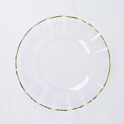 Clear hard plastic dinner plate with gold ruffled rim.