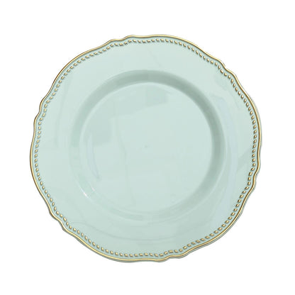 Jade green scalloped rim plastic dinner plate with gold trim.