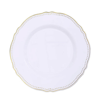 Elegant white plate with a gold scalloped edge design. Perfect for dining or decor.