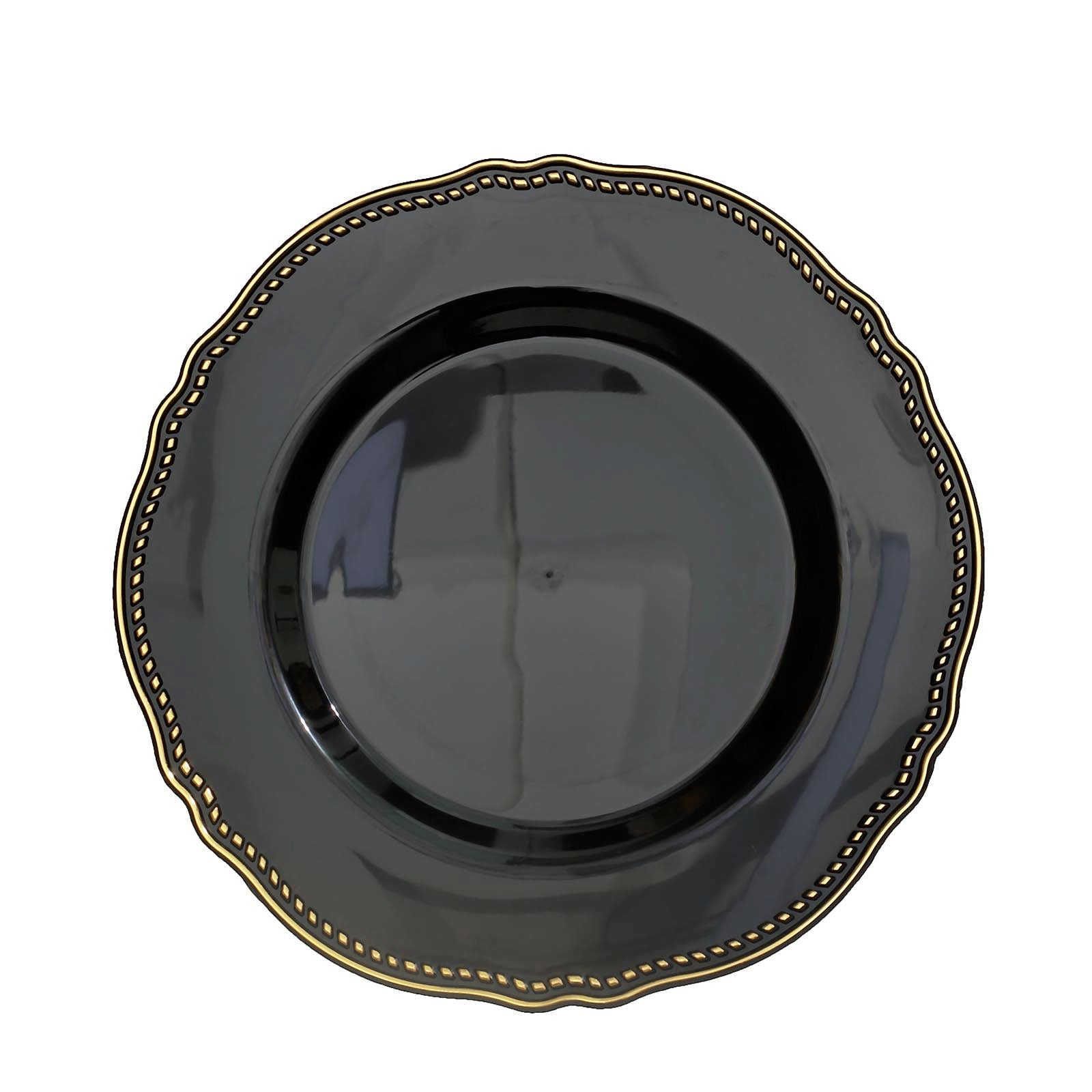 9" black scalloped rim plastic dinner plate with gold detailing.