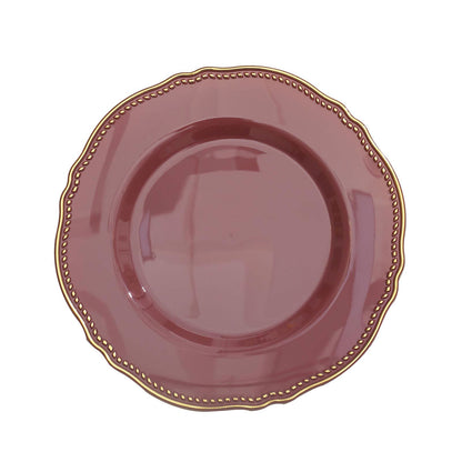 Elegant burgundy plate with gold scalloped rim, perfect for dining or decor.