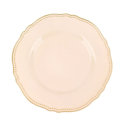 Elegant cream plate with a decorative gold edge and scalloped design. Perfect for dining.