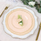 Elegant pink dinner plate with floral accents on a decorated table setting.