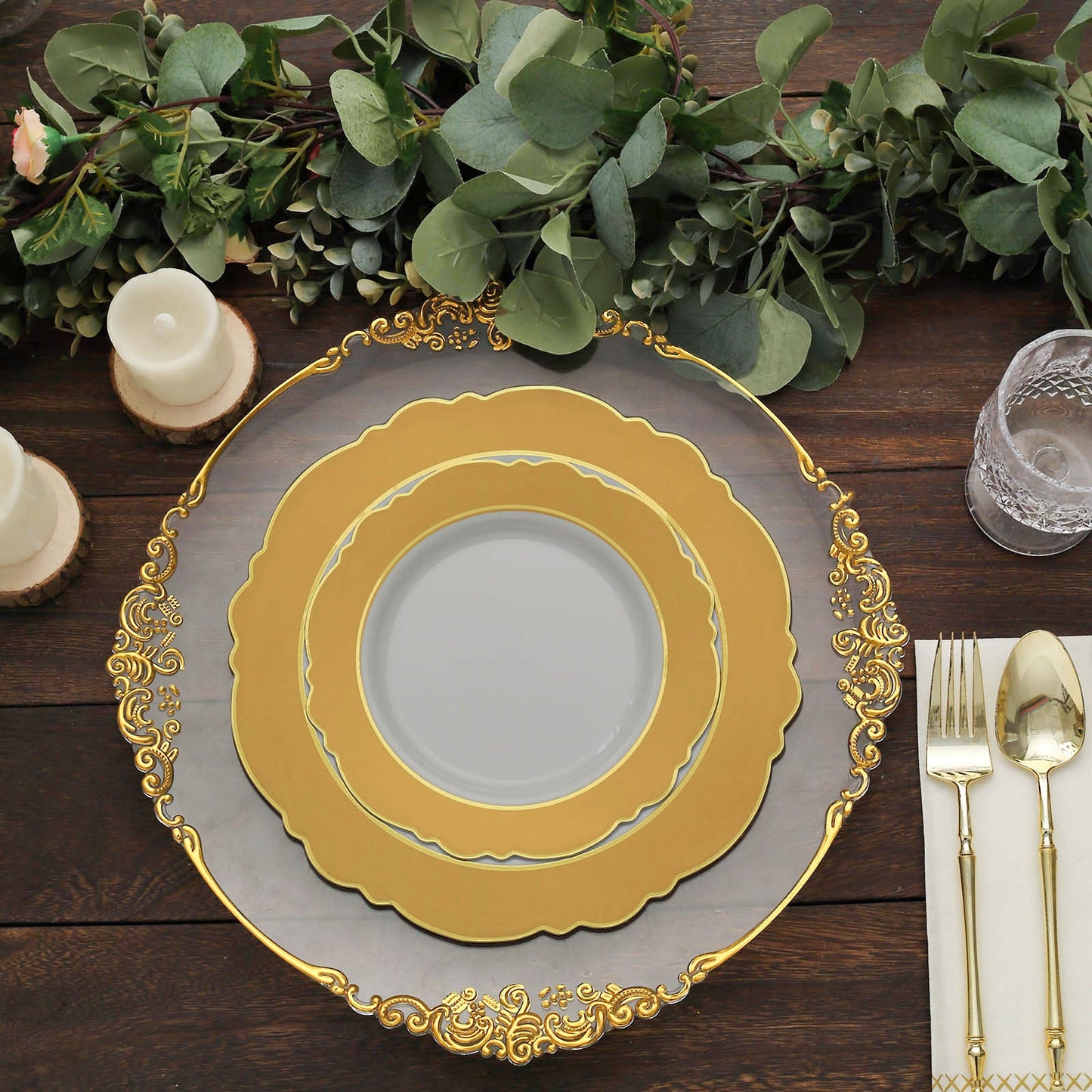 Gold and white disposable salad appetizer plates with round blossom design.