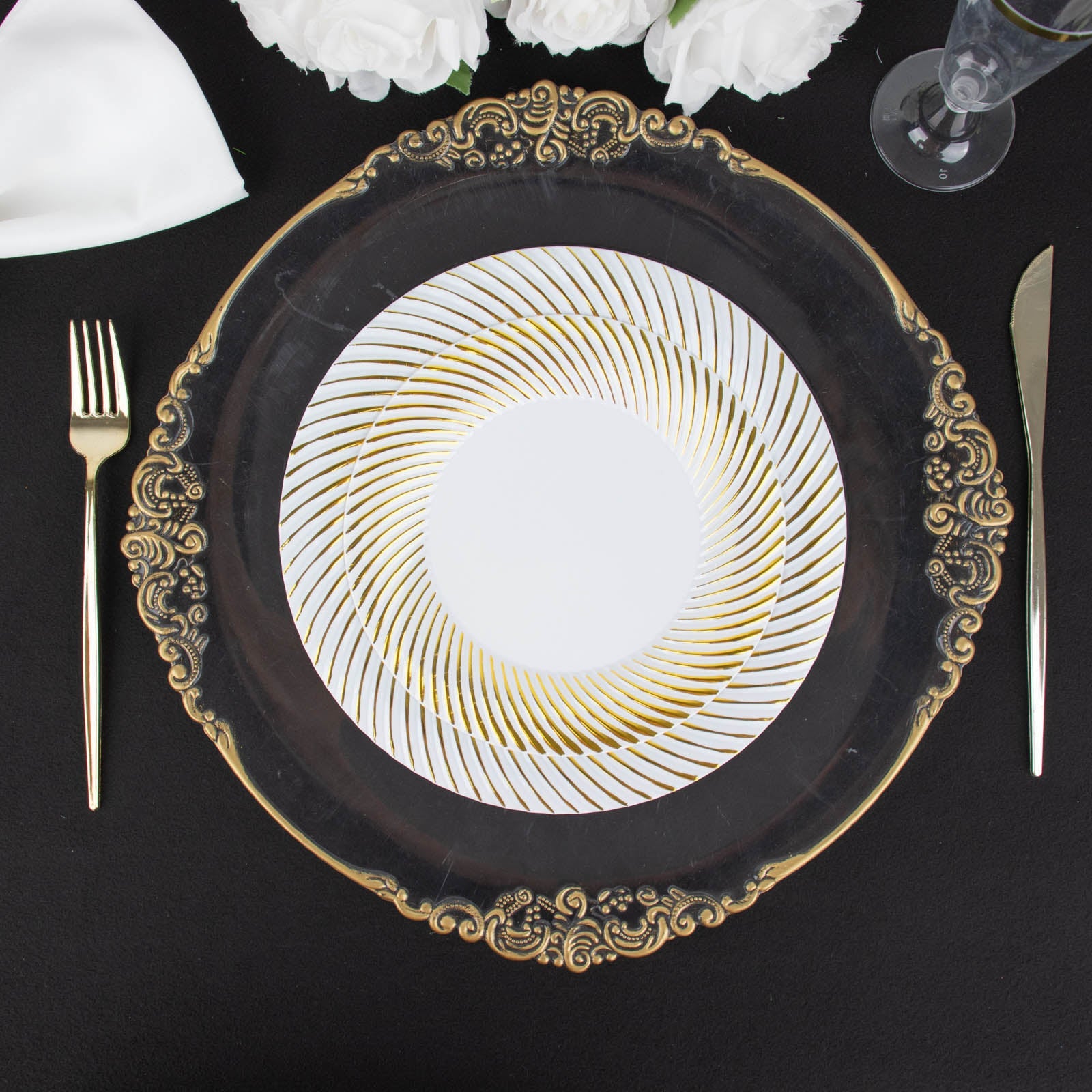 White plastic party plates with gold swirl rim, 9" round disposable dinner plates.