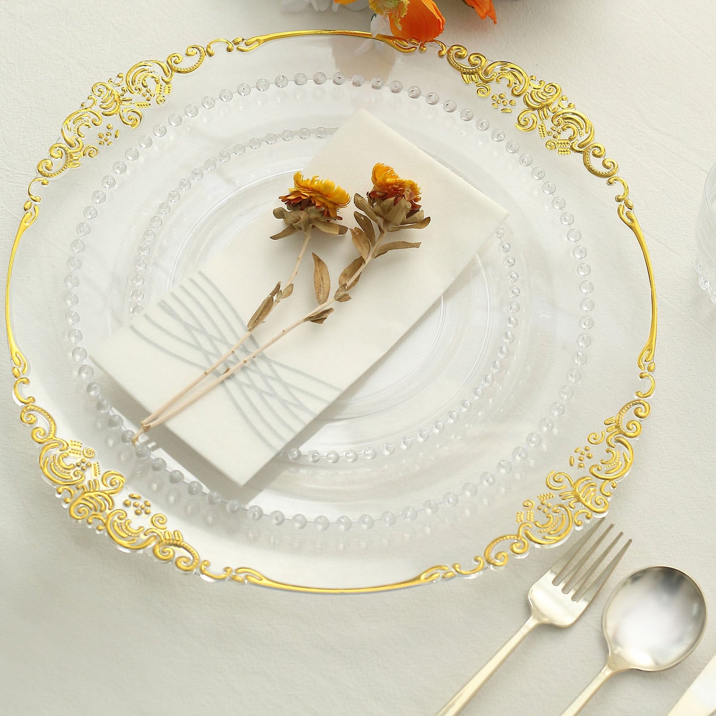 Clear plastic dessert plate with beaded rim, perfect for parties and events.