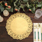 Gold lace paper doily on a wooden table with decor elements.
