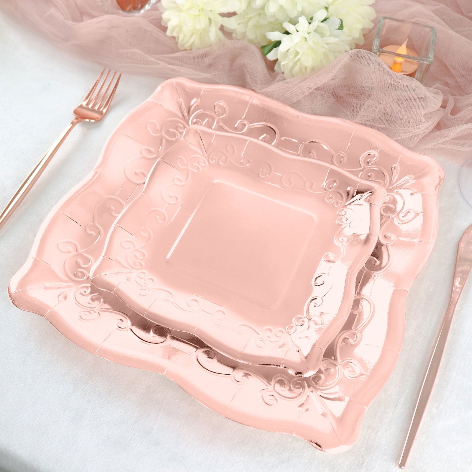 Rose gold vintage square dinner plates with embossed scroll design.