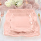 Rose gold square appetizer plates with embossed scroll design.