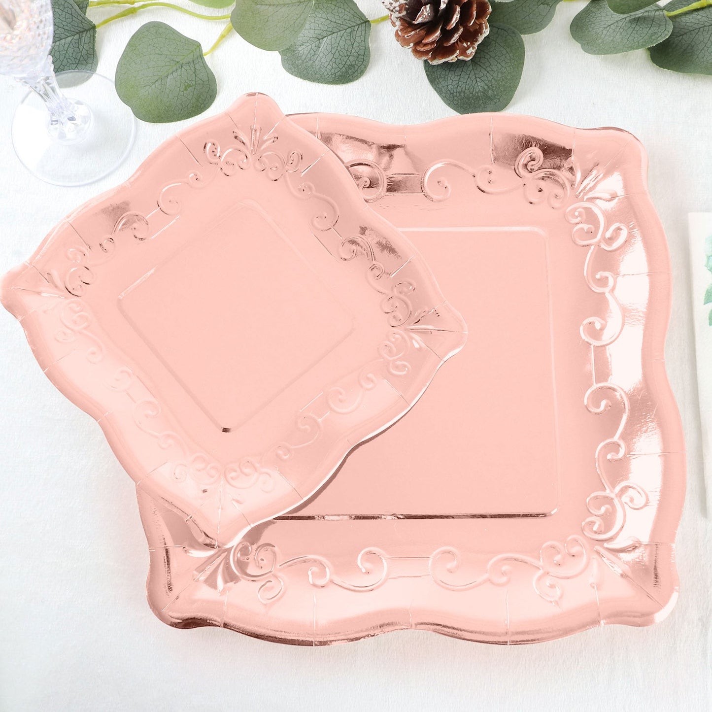 Rose gold square vintage appetizer plates with embossed scroll design.