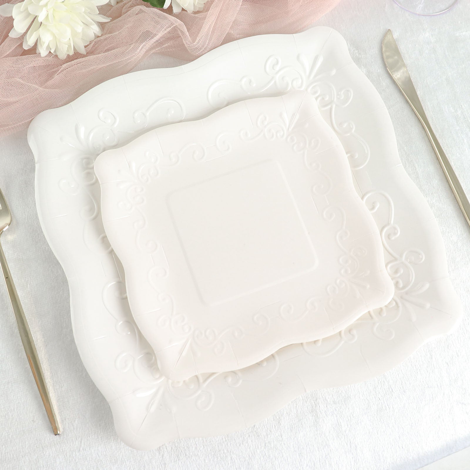White vintage square appetizer dessert plates with embossed scroll design.