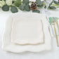 White vintage square appetizer dessert paper plates with embossed scroll design.