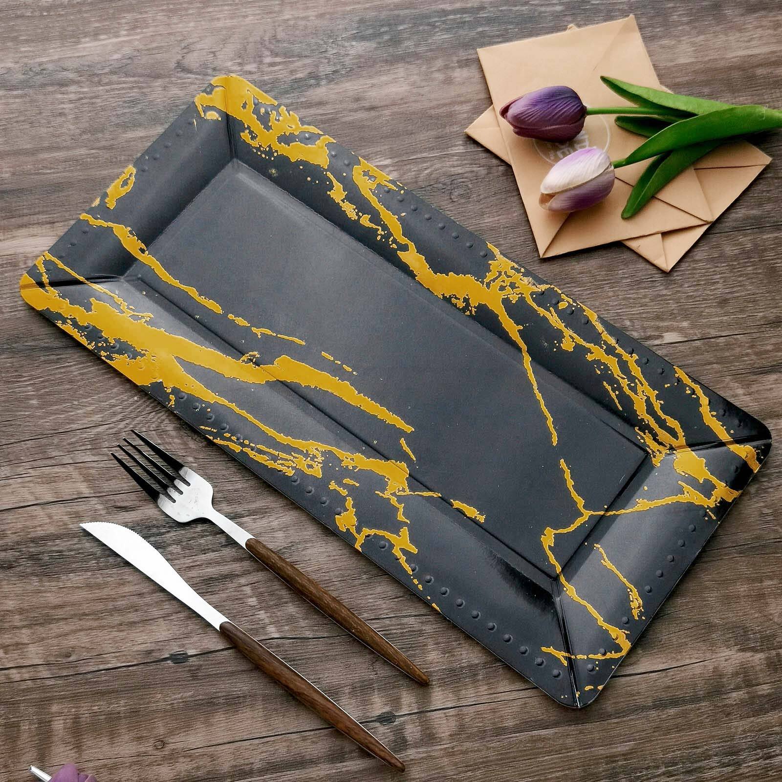 Black and gold marble heavy duty serving tray, 16 inches long.