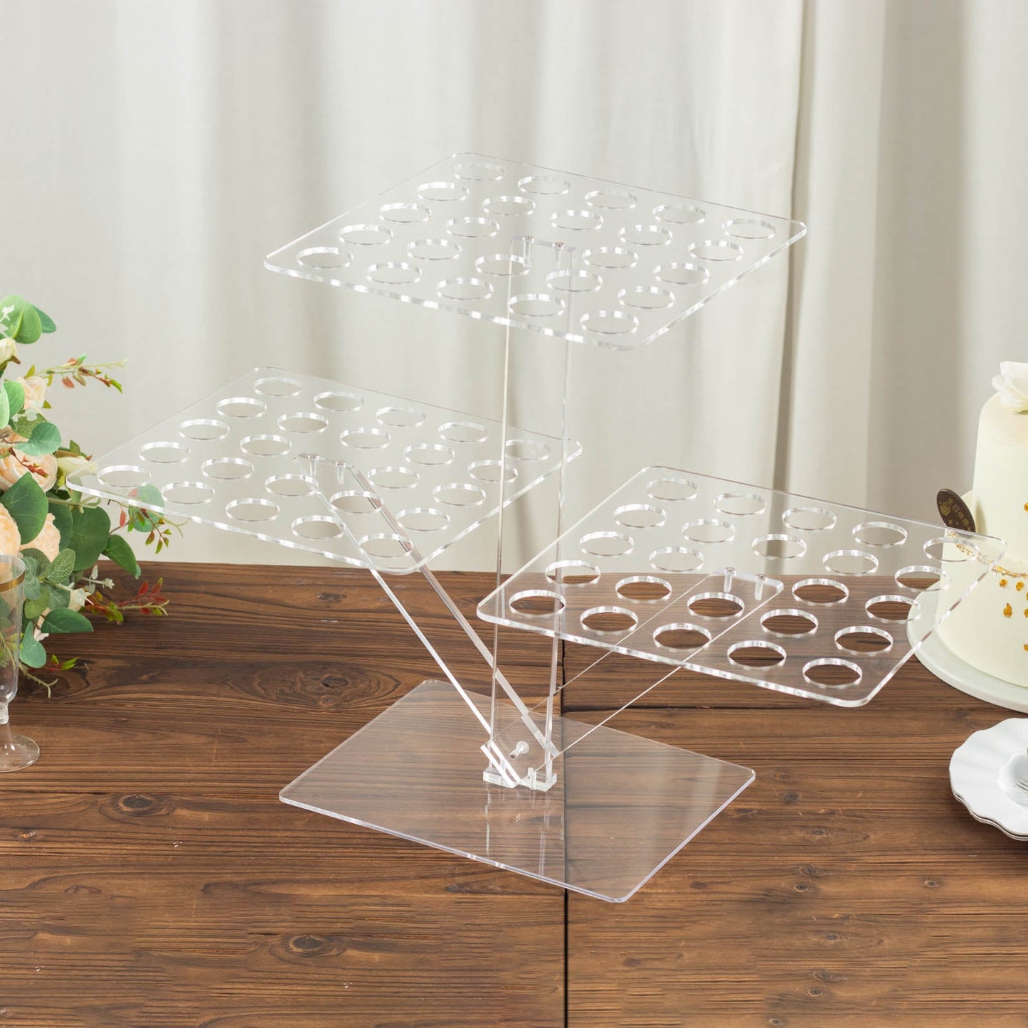 Clear 3-tier acrylic cupcake display stand for ice cream cones and shot glasses.