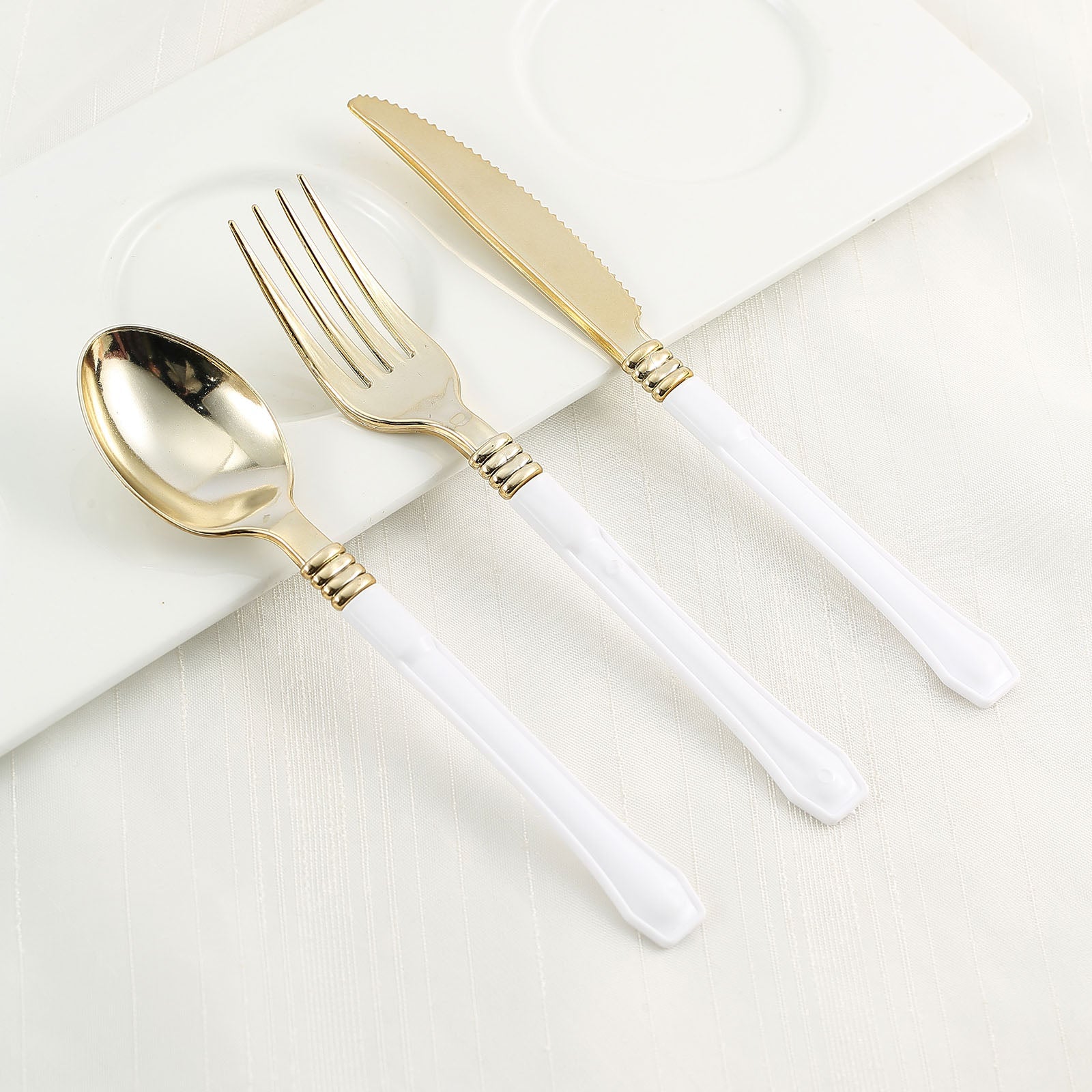 Gold plastic forks with white handles, heavy duty, 24 pack.