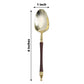 Gold and brown disposable dessert spoon with Roman column handle.