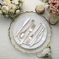 Rose gold heavy duty plastic silverware set on a decorative plate.