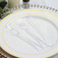 Elegant clear plastic cutlery on a decorative white plate with gold trim.