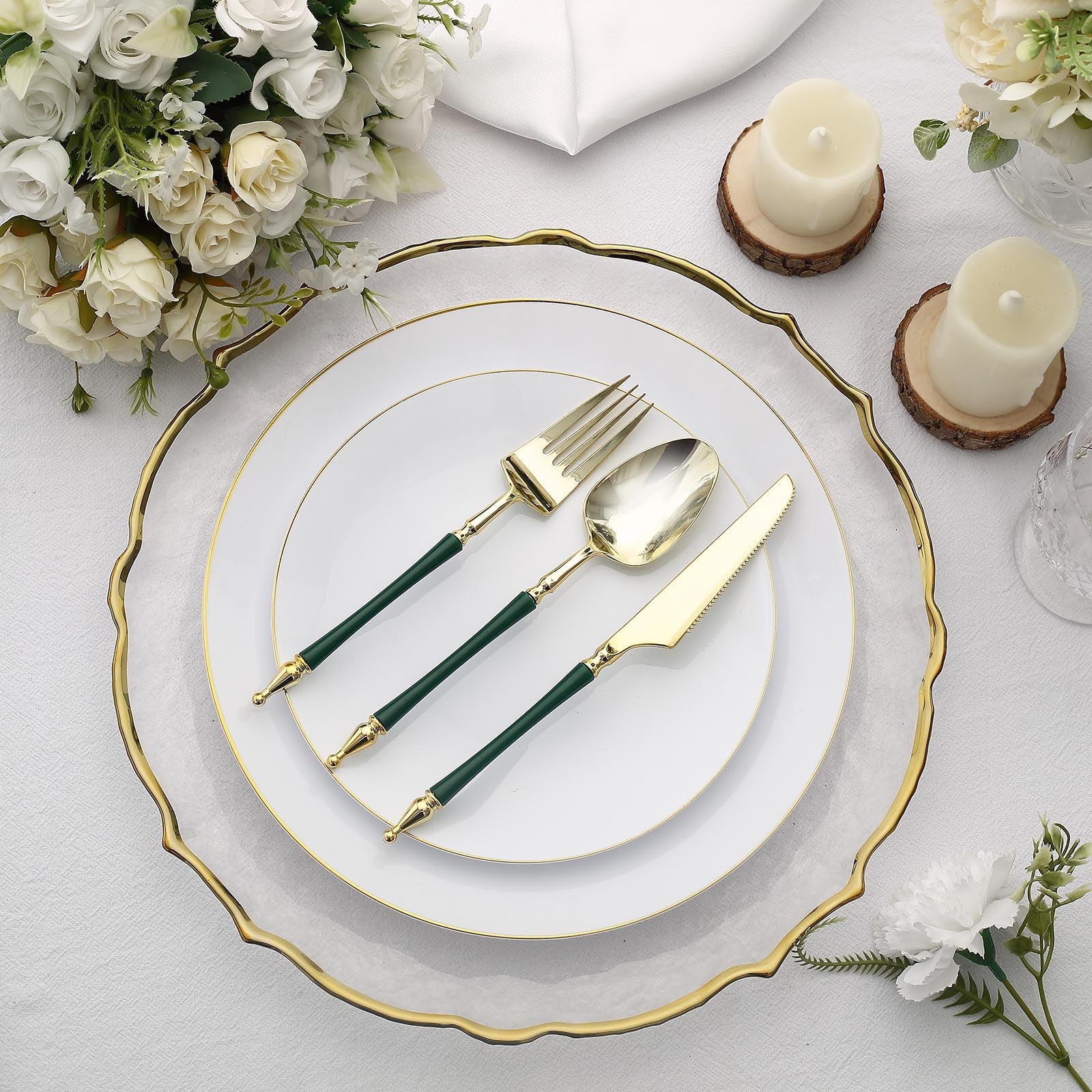 Gold and hunter emerald green disposable utensil set on elegant table setting.