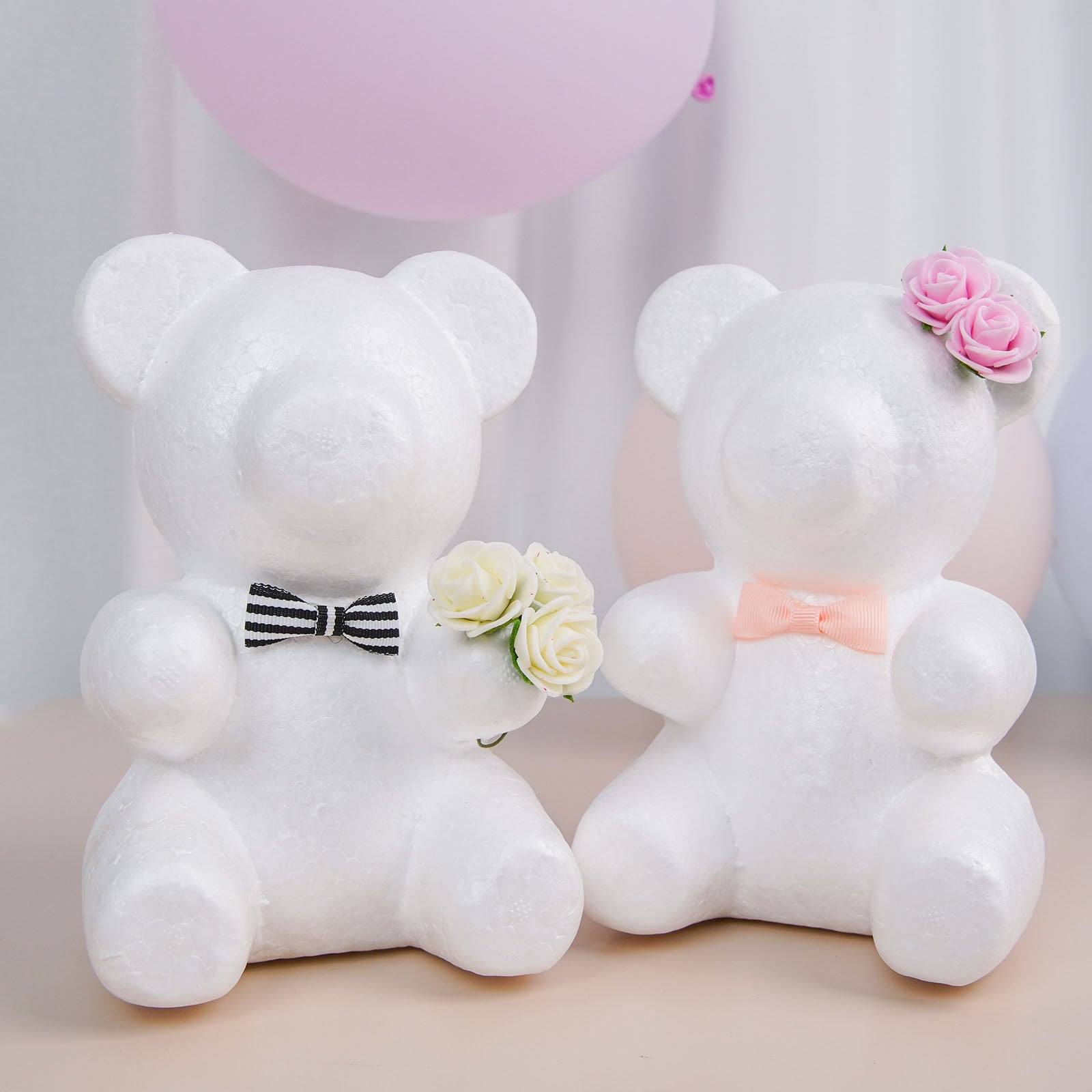 White 3D modeling styrofoam bears holding flowers, perfect for crafts.