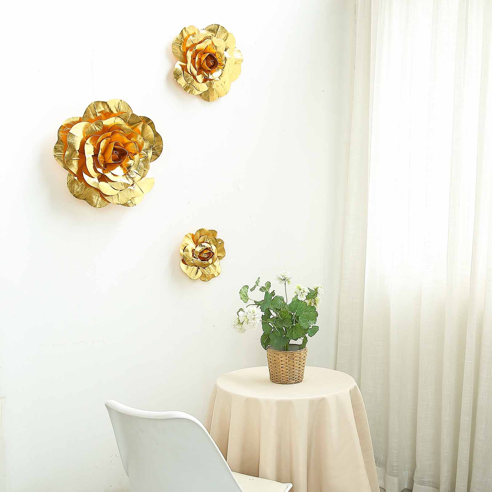Large metallic gold artificial foam roses for DIY crafts.