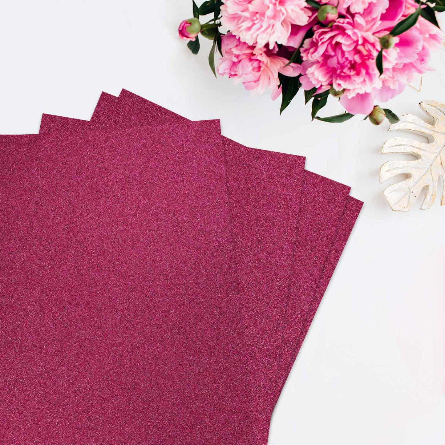 Hot pink self-adhesive glitter foam sheets for DIY crafts.