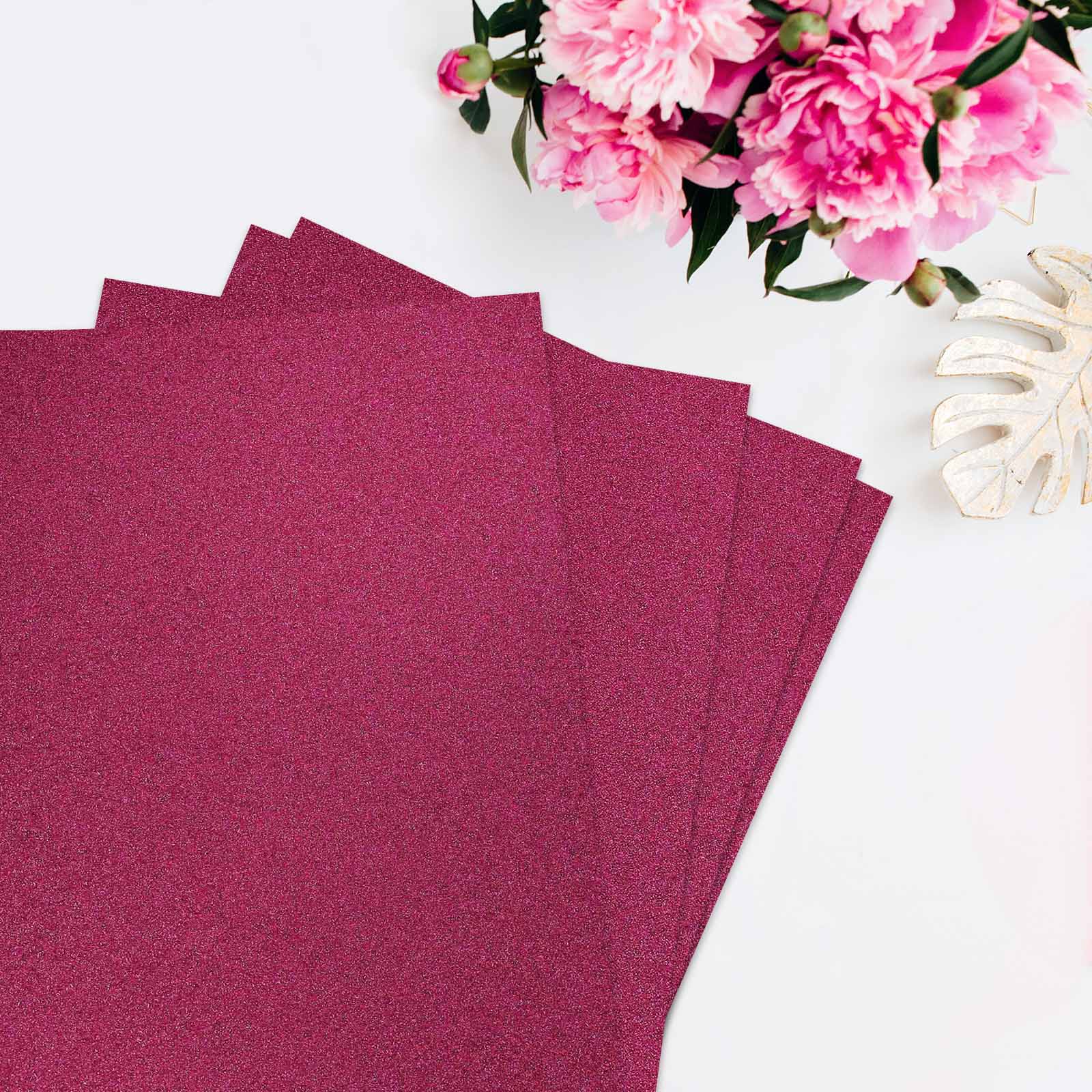 Hot pink self-adhesive glitter foam sheets for DIY crafts.