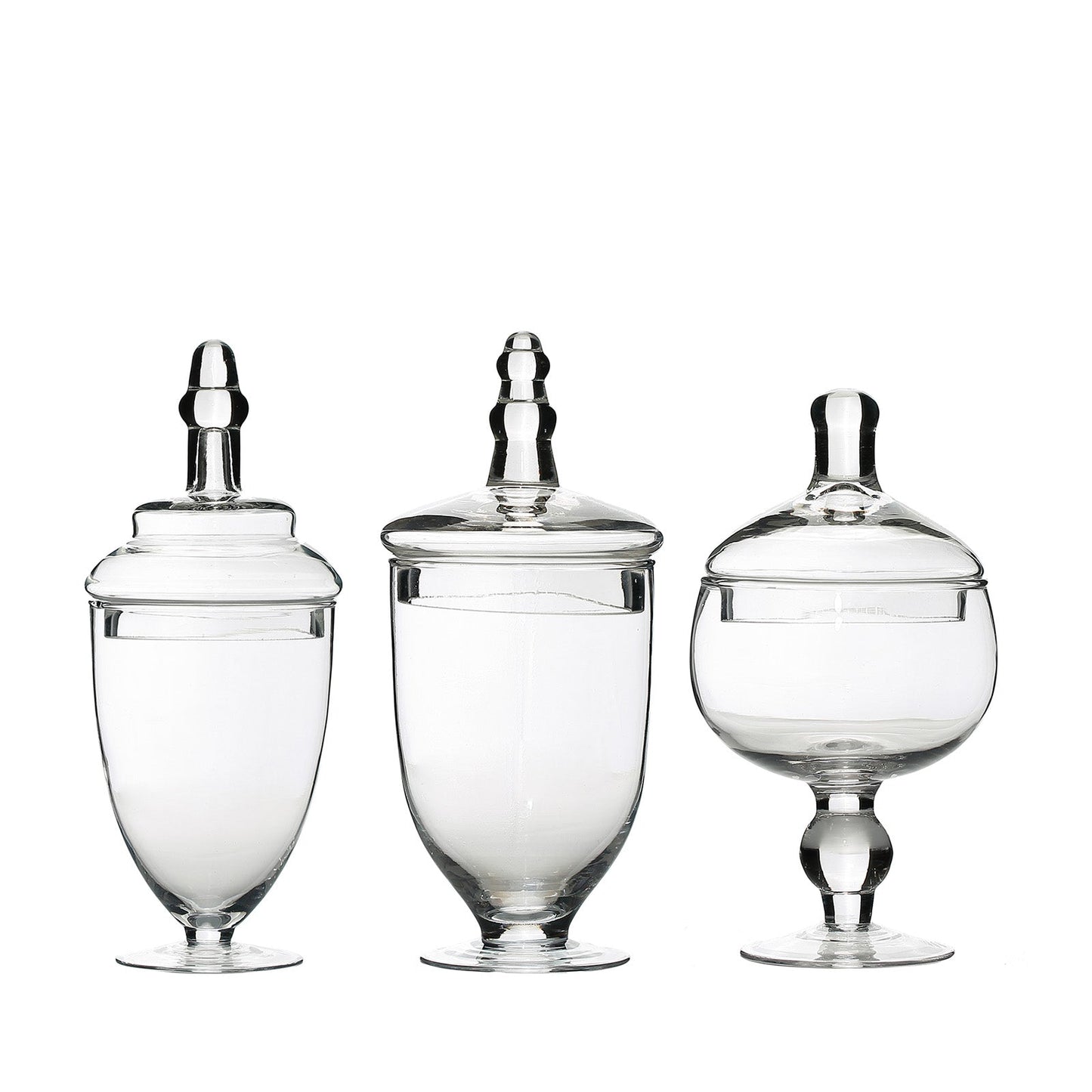 Clear apothecary glass jars with snap-on lids, decorative footed storage.