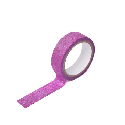 Hot pink glitter washi tape roll for crafting and decoration.