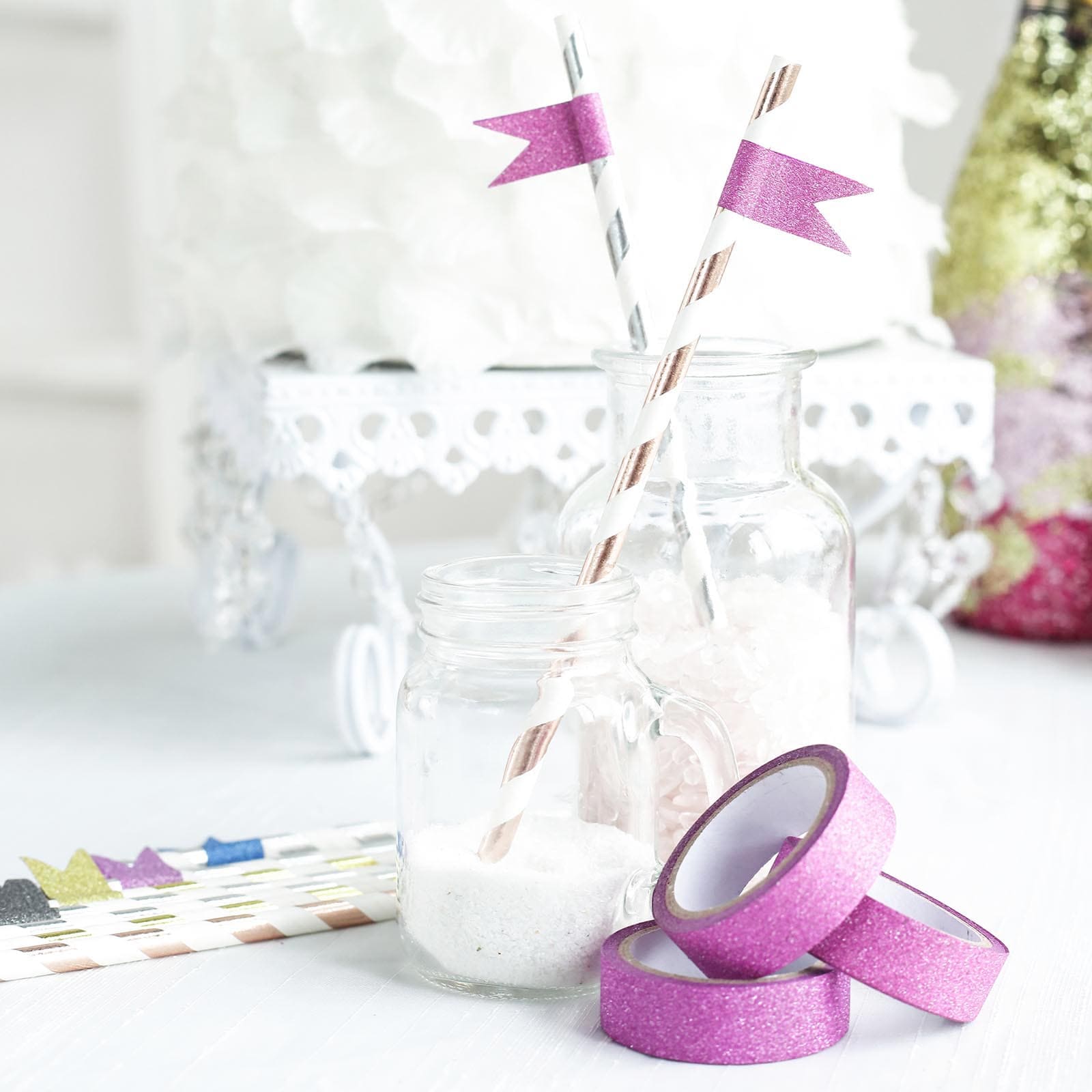 Hot pink glitter washi tape in a decorative craft setting.