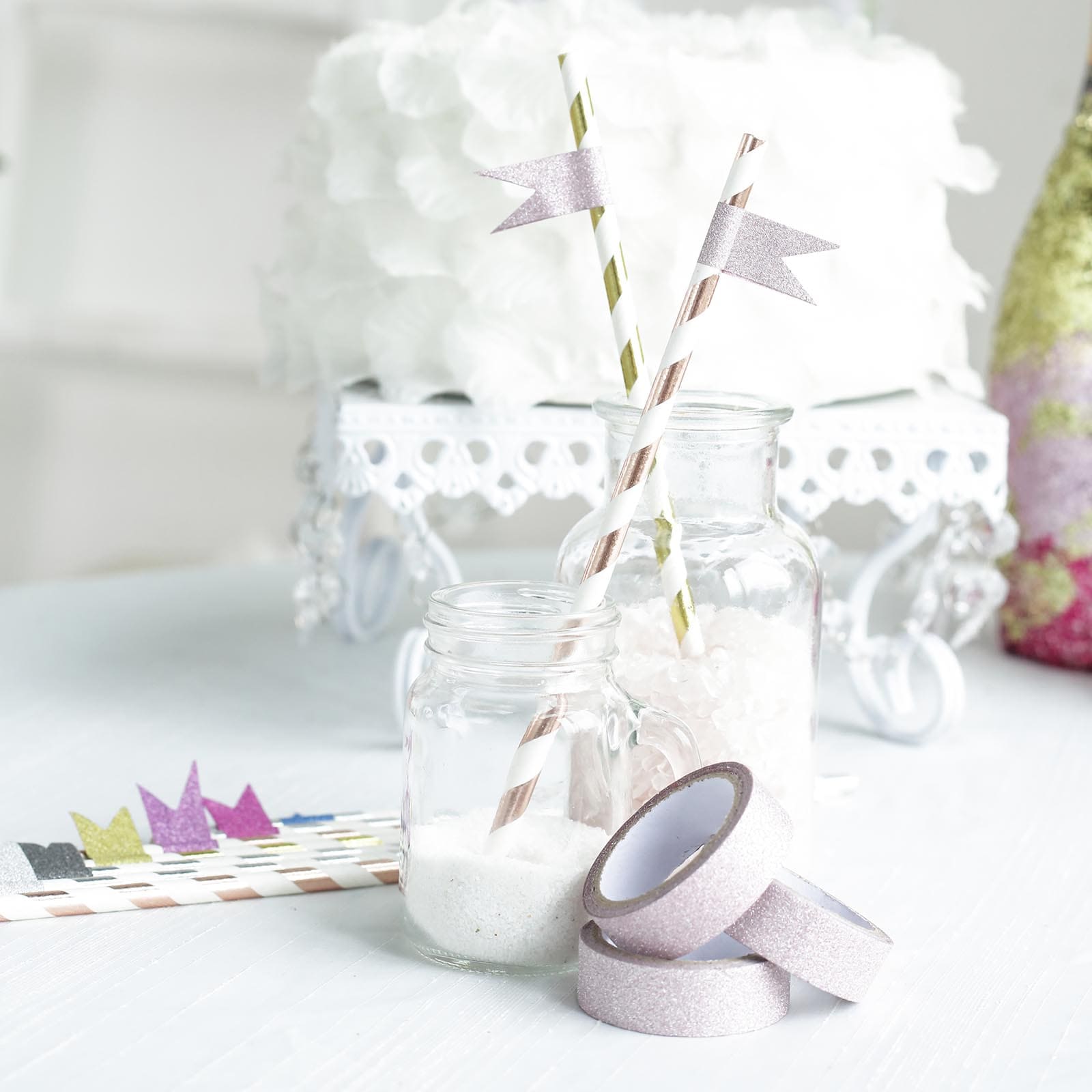 Pink glitter washi tape for DIY crafts in a stylish setup.