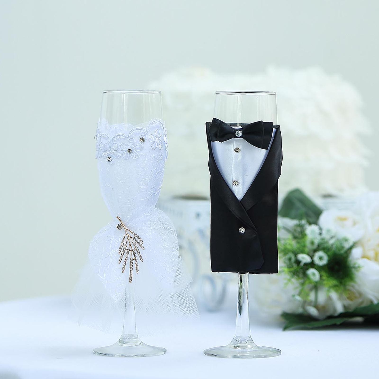 9" black bride groom koozie clear champagne glasses for wedding toasts.