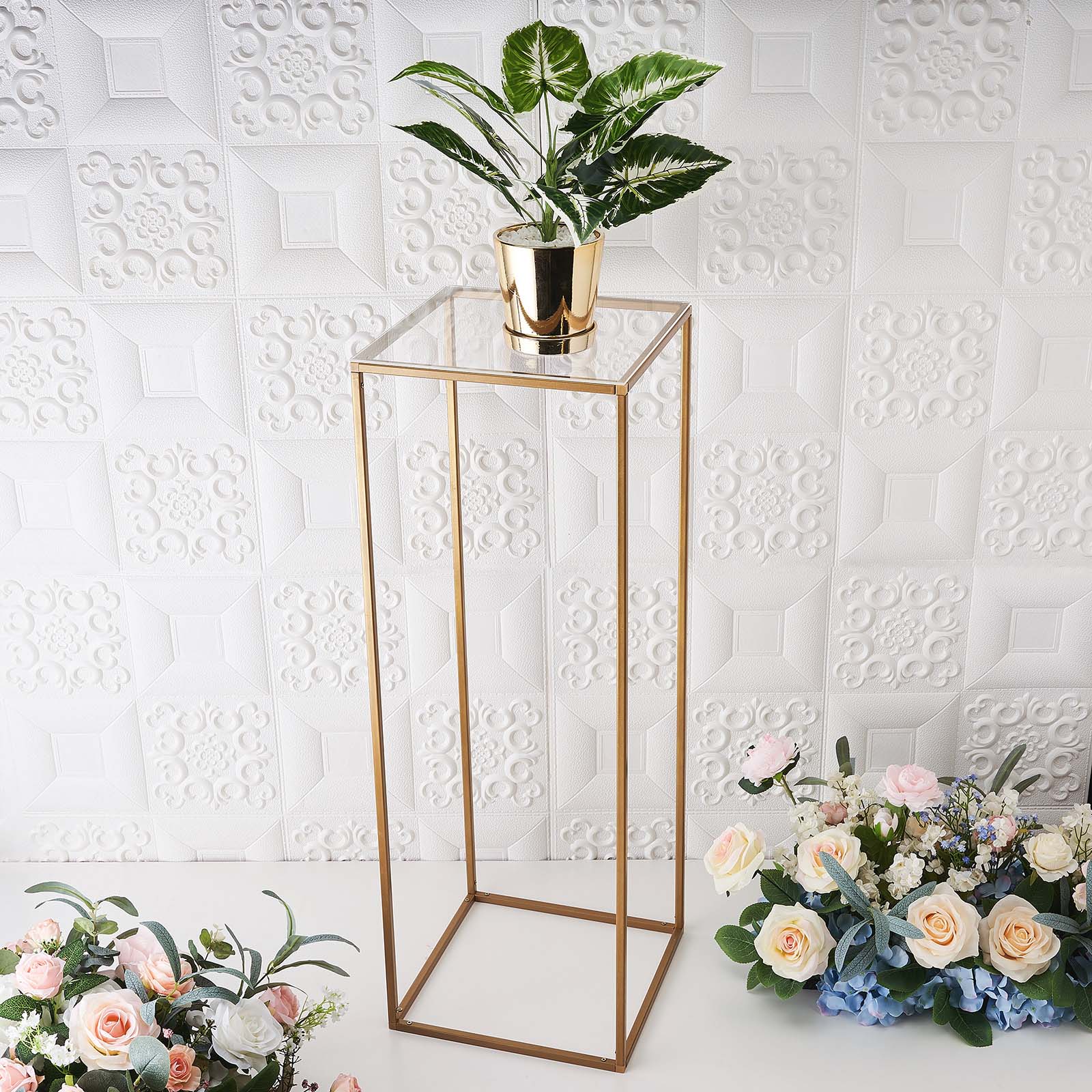Clear acrylic plexiglass sheets on a display stand with flowers.