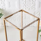 Clear acrylic plexiglass sheets on a gold table.