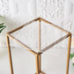 Clear acrylic plexiglass sheets on a gold table.