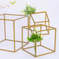 Gold metal geometric flower stands for wedding centerpieces.