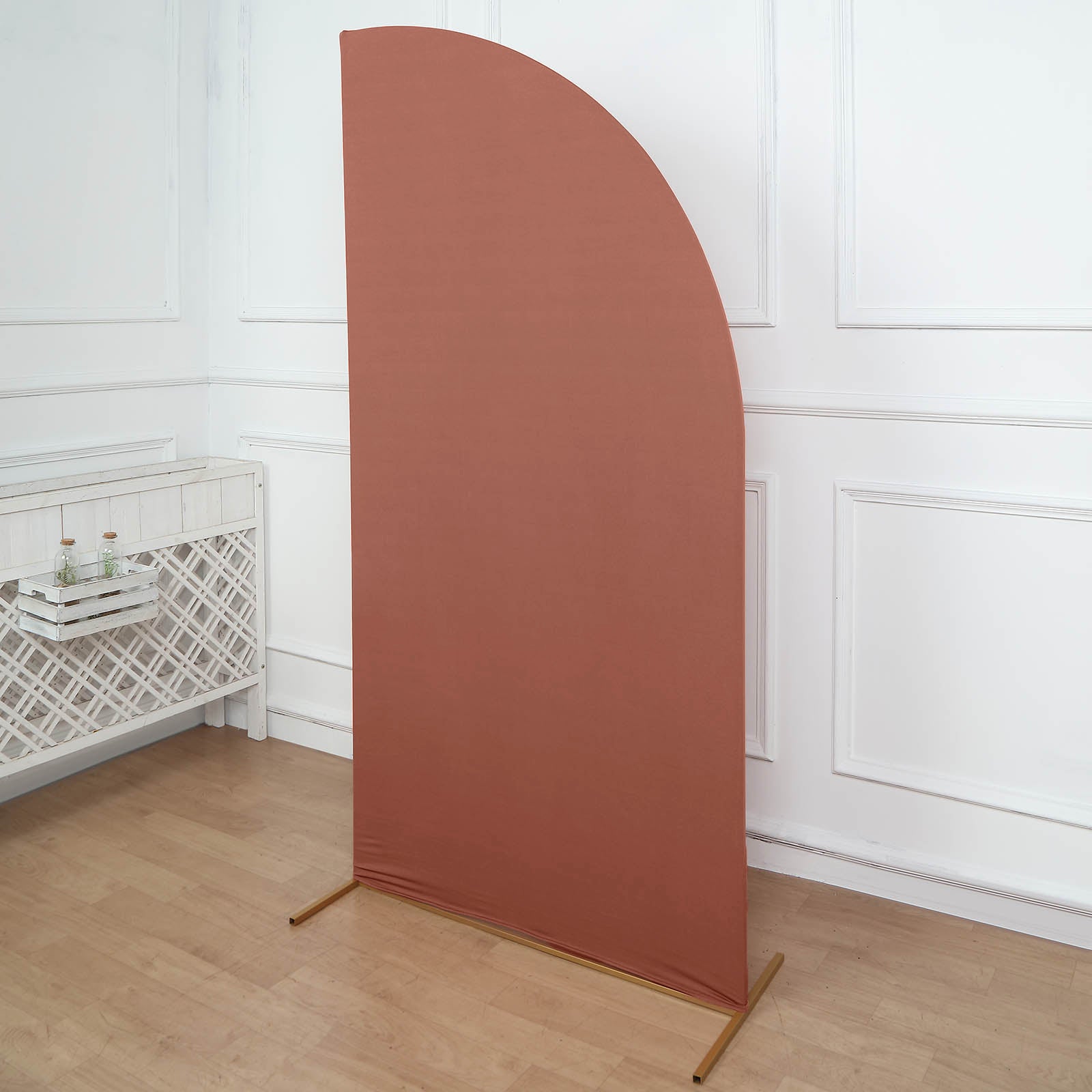 Matte terracotta fitted spandex half moon wedding arch cover.