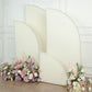 Matte ivory half moon backdrop stand covers with floral arrangements.